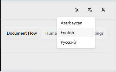 Üç seçimi (Azərbaycan, English, Русский) göstərən dil açılan menyusu açıq başlıq, hazırda aktiv olan dil vurğulanmış. Açılan menyunun ətrafında dar çərçivə normaldır — sadəcə onun qlobus ikonuna bağlandığını göstərmək üçün kifayət qədər ətraf kontekst.